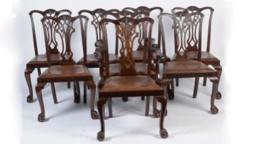 A set of eight George III style mahogany dining chairs in the Chippendale taste