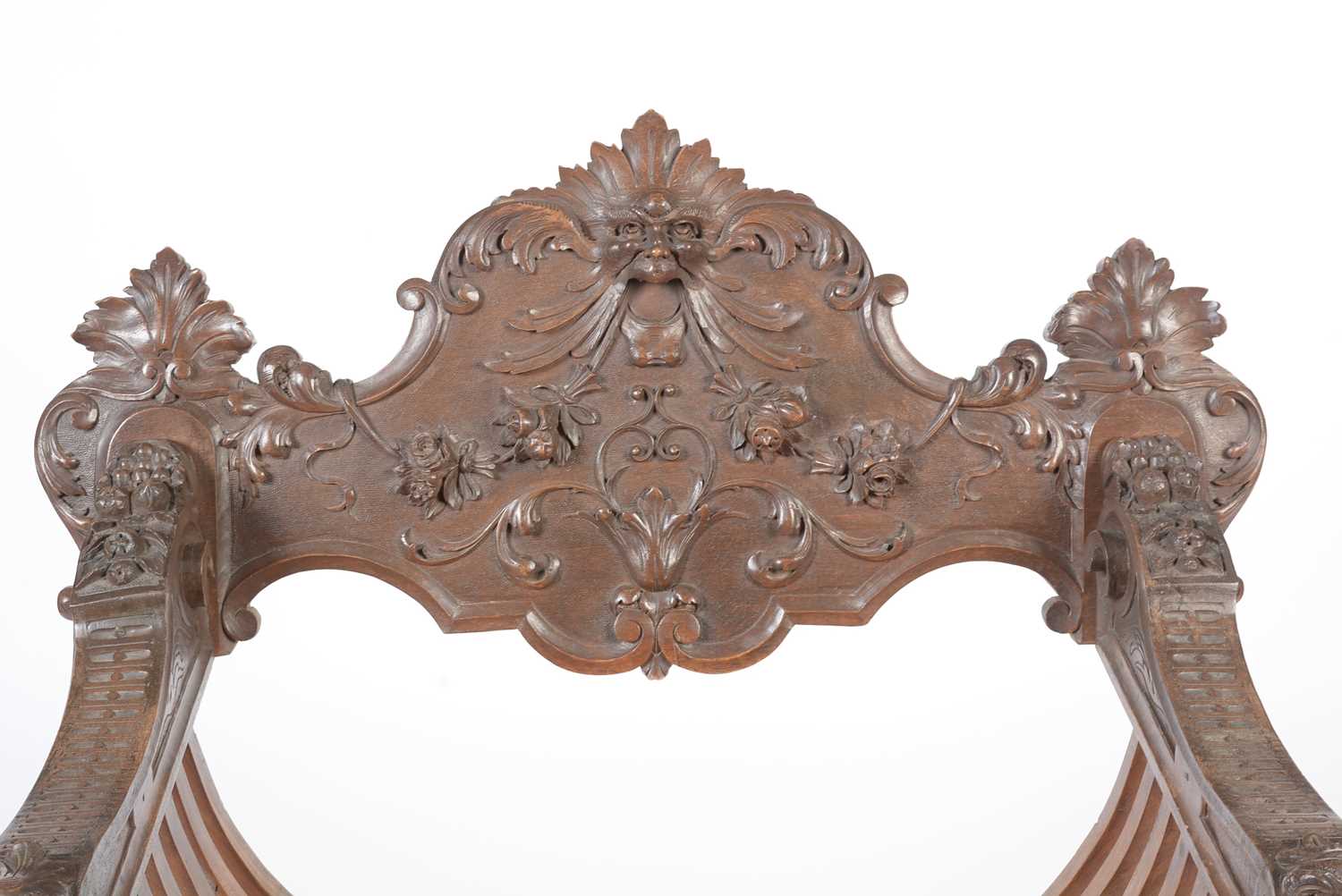 A decorative Italian carved walnut Savonarola chair c1900 - Image 17 of 21