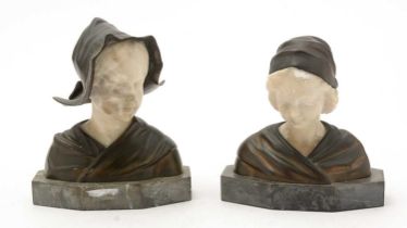 G. Moerlin, German (fl early 20th Century): a pair of busts