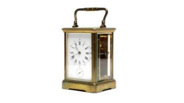 A late 19th Century French brass carriage alarm clock.