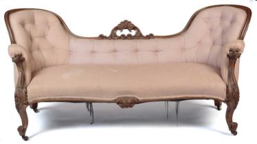A Victorian carved rosewood serpentine 'show frame' sofa