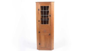 Thomas 'Gnomeman' Whittaker (of Littlebeck): an oak floor standing corner cupboard