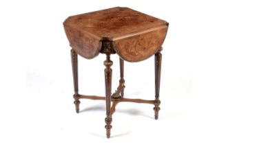 An attractive French marquetry and walnut drop-leaf centre table c1900