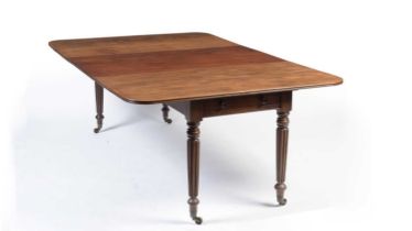 An unusual late Georgian mahogany extending Pembroke dining table