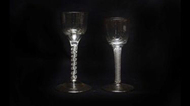 Two opaque twist stem wine glasses