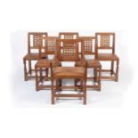 Robert 'Mouseman' Thompson (of Kilburn): A set of six 1950's oak dining chairs