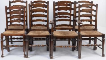 A harlequin set of eight 19th Century oak North Country ladderback dining chairs