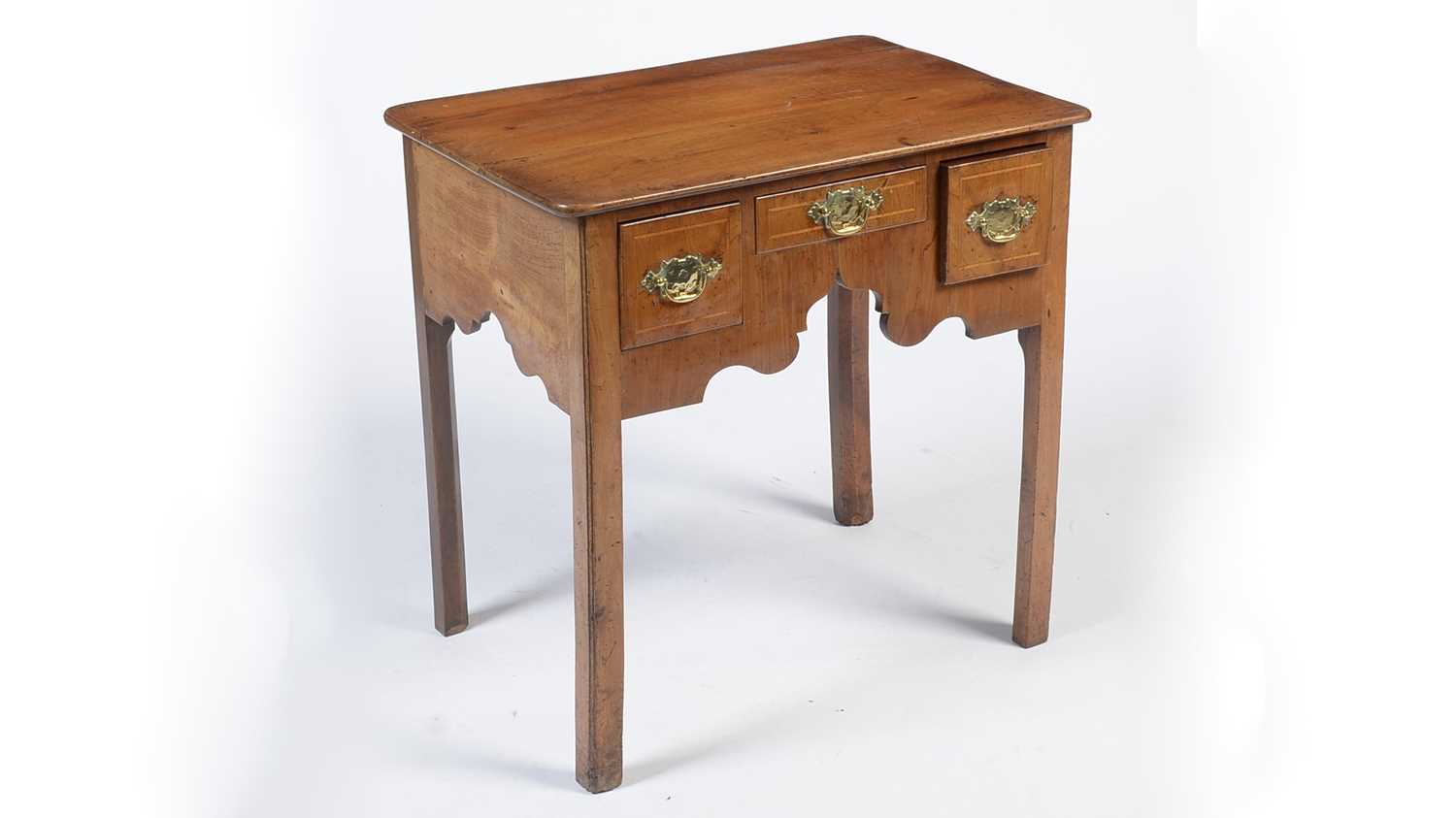 A mid 18th Century walnut lowboy