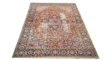 An early 20th Century Heriz carpet