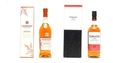 Two bottles of whisky by Tomatin and Glenmorangie