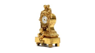 A decorative cast gilt brass boudoir clock