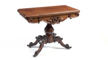 A Victorian rosewood card table