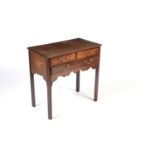 A Georgian mahogany lowboy