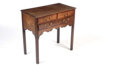 A Georgian mahogany lowboy