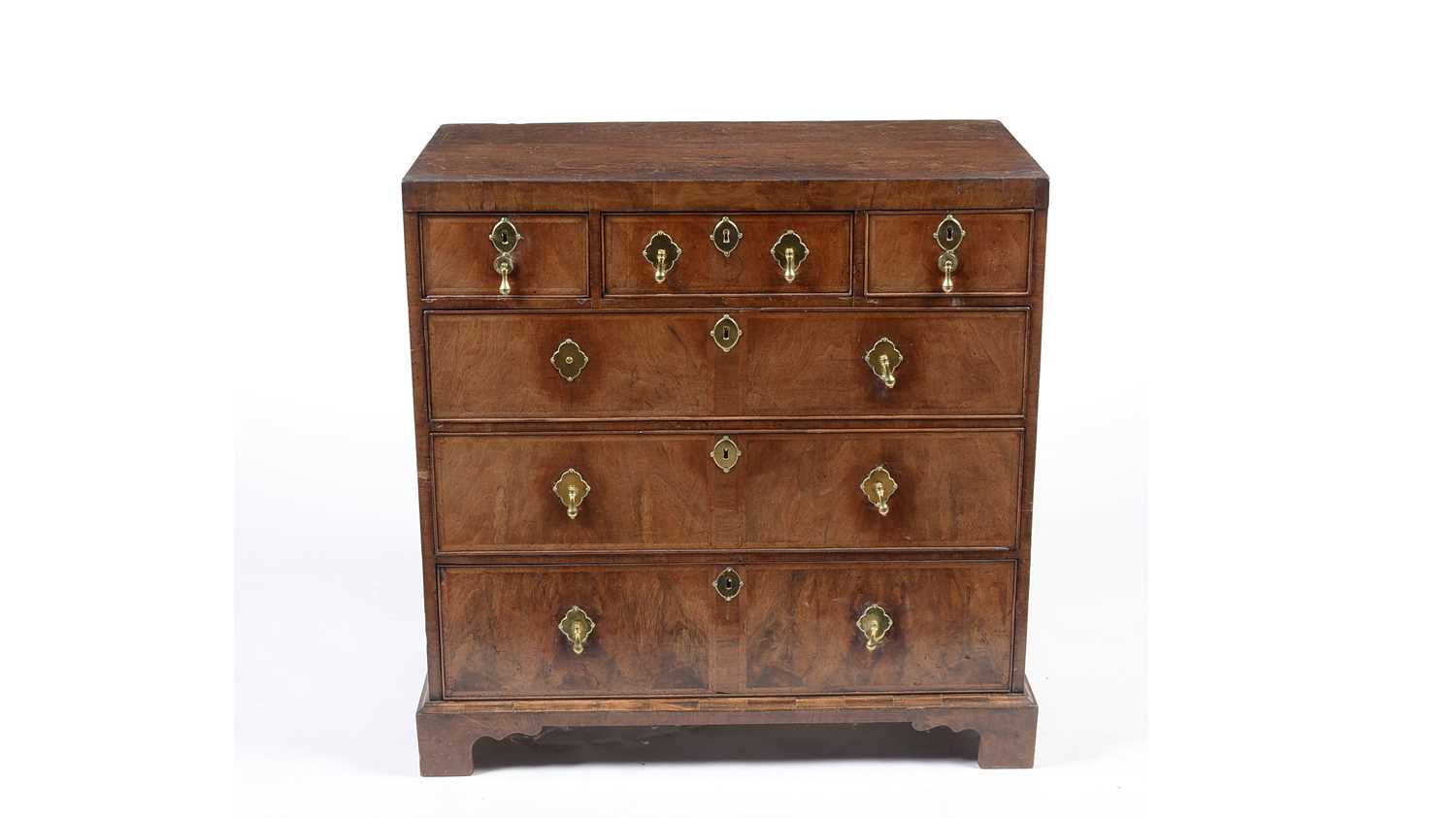 A 18th Century walnut and oak chest of drawers