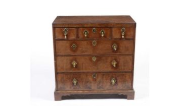 A 18th Century walnut and oak chest of drawers
