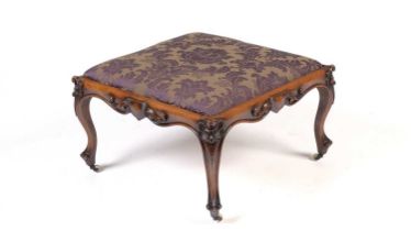 An attractive Victorian carved walnut large stool