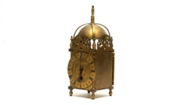 A replica brass lantern timepiece