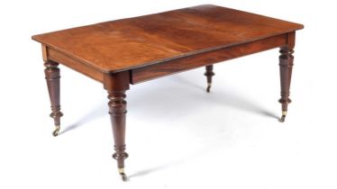 A Victorian mahogany extending dining table