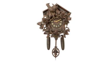 A Swiss carved oak cuckoo wall clock, late 19th century