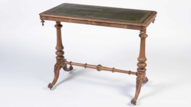 A Victorian oak centre writing table