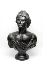 A black painted plaster bust of Roman design