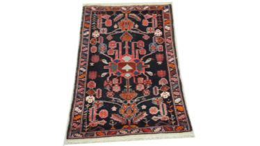 An early 20th Century Rodbar rug