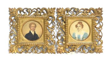 19th Century British School - Portrait miniatures depicting a young husband and wife | watercolour