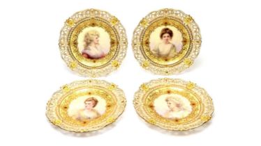 A set of four Coalport Chicago Exhibition cabinet plates