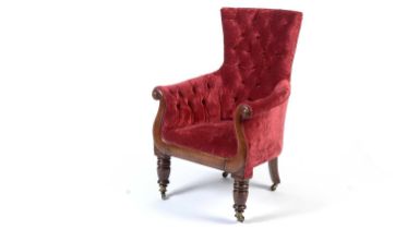 A Regency mahogany framed button-back library chair