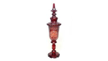 A mid 19th century Bohemian ruby flash glass goblet and cover