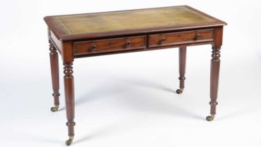 An early Victorian mahogany writing table