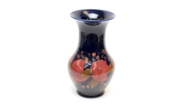 A Moorcroft pomegranate pattern vase