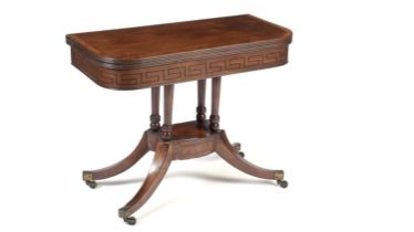 A Regency inlaid mahogany and rosewood crossbanded card table