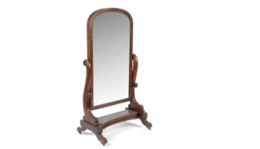 A Victorian mahogany cheval mirror