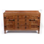 Robert 'Mouseman' Thompson of Kilburn: a 1950's 5' panelled English oak sideboard