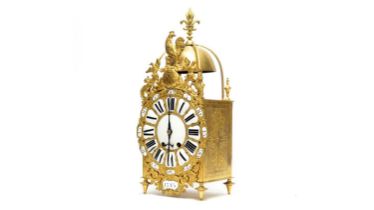 An ornate French brass hanging lantern clock, late 19th/20th Century