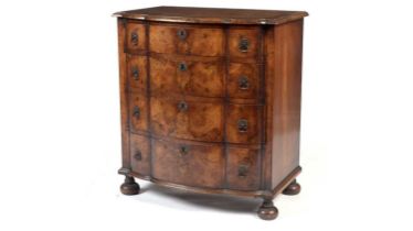 A Dutch style walnut and burr walnut bowfront chest of drawers