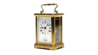 A French brass carriage alarm clock, c1900.