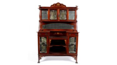 An early 20th Century Arts and Crafts mirror backed sideboard in the manner of Shapland and Petter