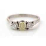 Three stone yellow and white diamond ring