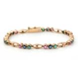 A 14ct yellow gold and gem set bracelet