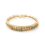 A 14ct yellow gold and turquoise bracelet