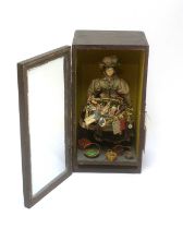 A 19th Century peddler doll,