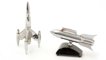 Two mid-20th Century chrome rocket pattern table lighters,