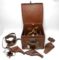 A selection of First World War period 'Sam Brown' belts, spurs, holsters