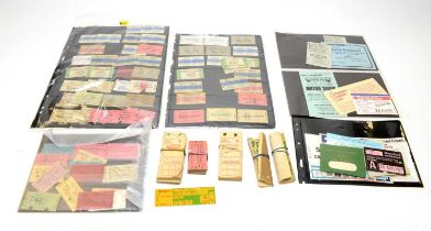 A collection of ticket stubs and luggage stubs,