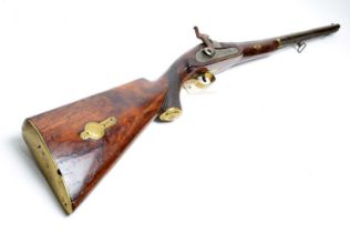 A 19th Century percussion action rifle,