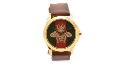 Gucci: a gilt metal cased quartz wristwatch