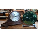 A continental Art Deco mantel clock with mirrored dial on a walnut and aluminium stand 24 cm high